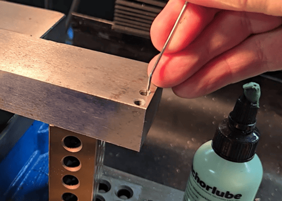 Removing broken tap fragments using picks and pin vise from the Omegadrill set