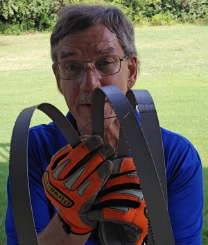 Kurt demonstrating how to safely hold a partially opened band saw blade