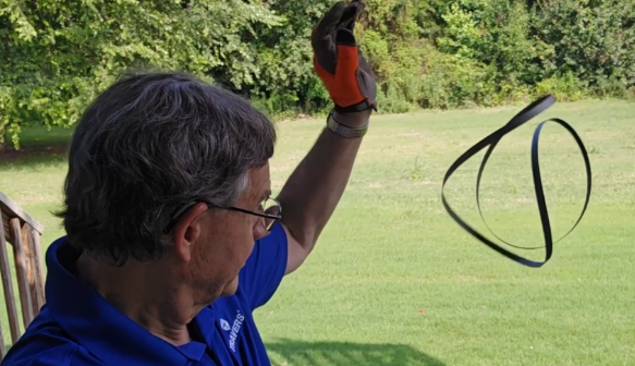 Kurt releasing a partially opened band saw blade onto a soft surface