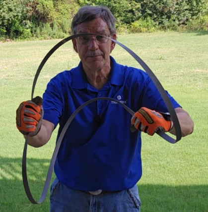 Kurt twisting a band saw blade to form loops