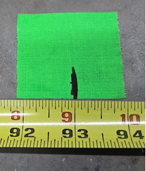 Move the blade aside and measure the distance between the marks on the two pieces of tape. The measured distance is the blade's length