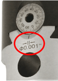 Close-up of a boring head dial with 0.001” graduations used for precise bore diameter adjustment in machining.
