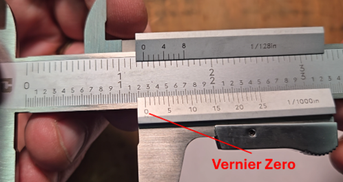 Locating the vernier zero on a vernier caliper